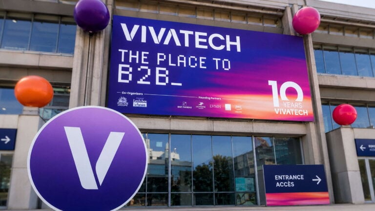 VivaTech event banner showcasing The Place to B2B with colorful balloons and entrance signs for a tech exhibition.